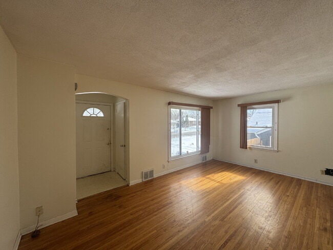Photo - "Charming 3-Bed Haven with Hardwood Floors & Cozy Fireplace in St. Louis Park!"