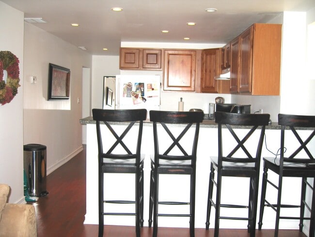 Eat in Kitchen Bar Area (Example with furniture) - 1109 1st Ave N Apartments Unit 1