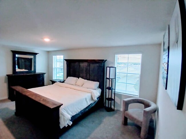 Master bedroom with a walk in closet - 8602 SW 46th Ave House