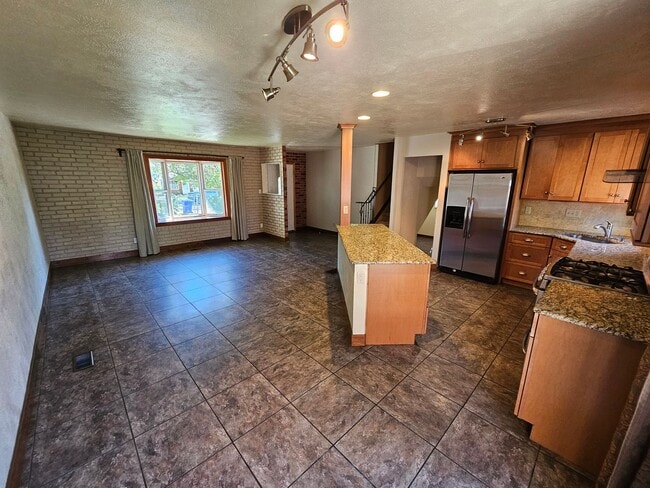 Photo - Charming 3-Bed, 2-Bath Tri-Level Home with Spacious Backyard & Gazebo