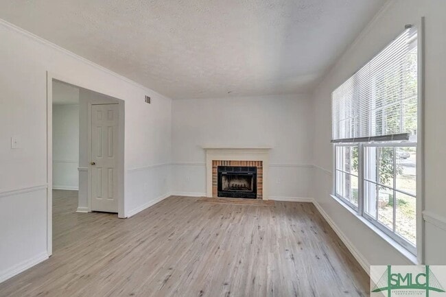 Photo - Spacious 2-Bedroom Brick Townhome with Private Fenced Yard