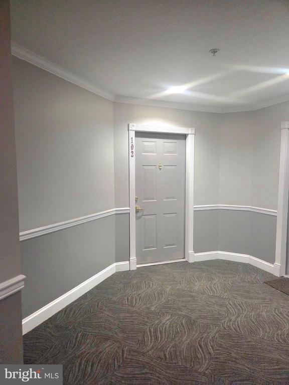Building Photo - 8181 Carnegie Hall Ct Unit 102
