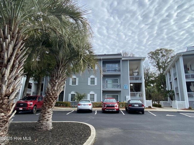 Building Photo - FULLY FURNISHED CONDO in sought-after Sea Trail subdivision!