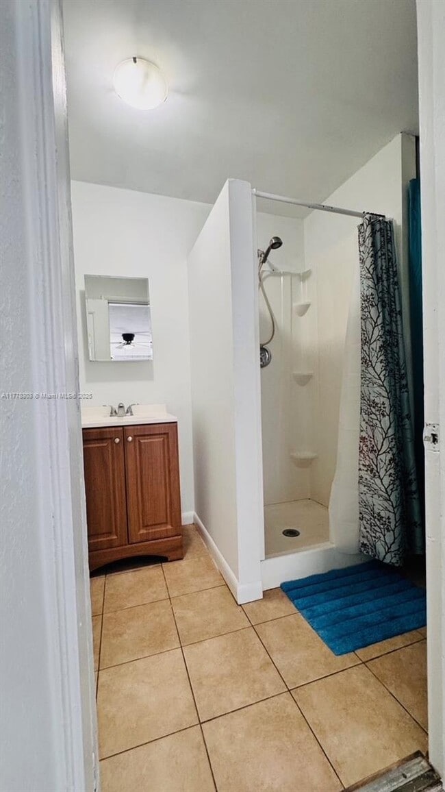 Photo - 7530 NW 12th Ave Apartment Unit side
