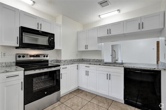 Building Photo - 3515 NW 94th Ave Unit 8A Rental