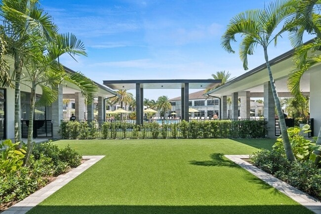 Building Photo - Premium Lake-View URBANA Residence Steps from Downtown Doral