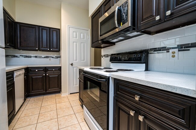Building Photo - 1103 Dulles Ave Unit 402