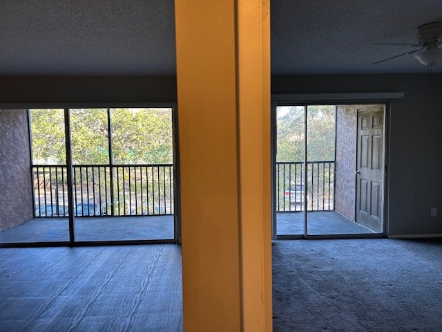 Living room and master bedroom - 4209 Winding Moss Trl Condo Unit 205