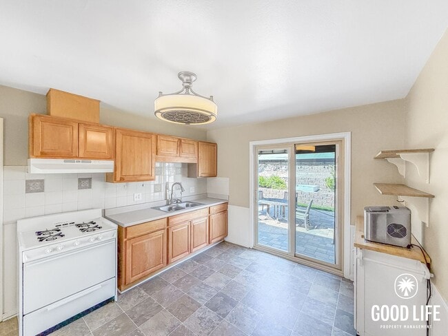 Photo - Comfortable 3B/1BA Rolando Park Home with Washer/Dryer, Attached Garage and Private Backyard Patio