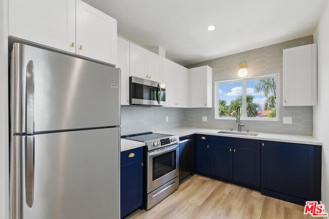 Building Photo - 6350 Willoughby Ave Unit 11 Rental