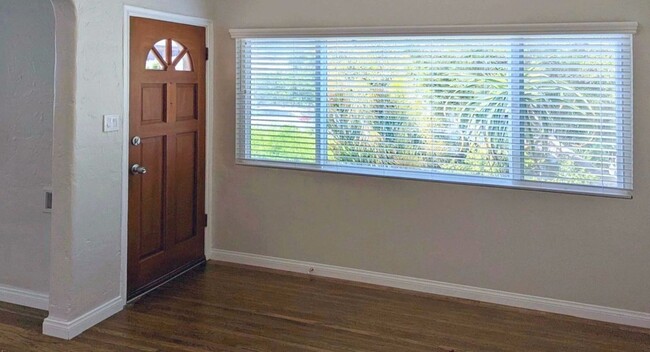 Your Living Room's beautifully refinished Hardwood Floors - 1830 S Curson Ave Apartments