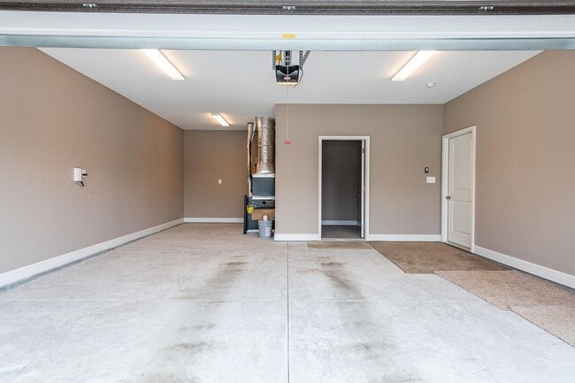 garage with storage room - 1636 Silver Spur Ln