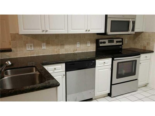 Building Photo - 9610 NW 2nd St Unit 104