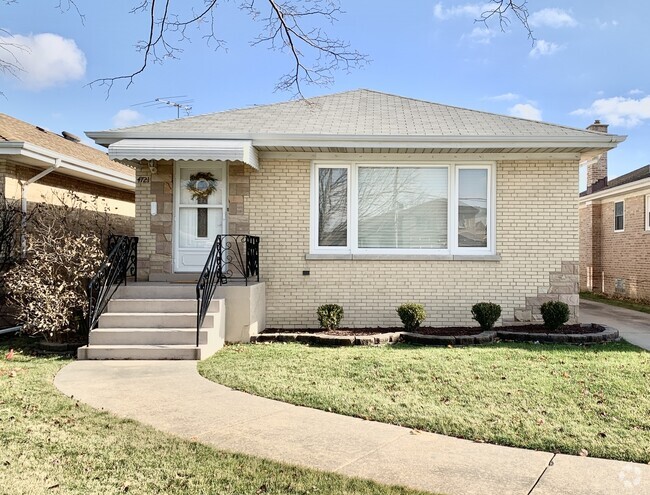 Building Photo - 4721 N Ozanam Ave Rental