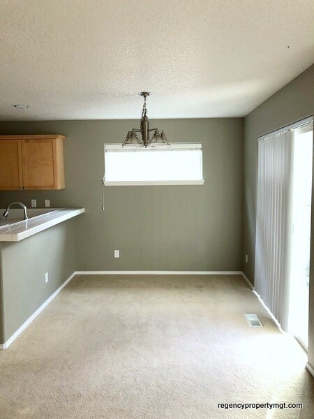 Photo - Beaverton 3 bd, 2.5ba. Kitchen w/white til...