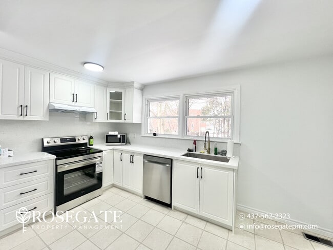 Photo - Spacious 3-Bedroom Main-Level Home with Porch, Backyard & Parking in London Unit 1