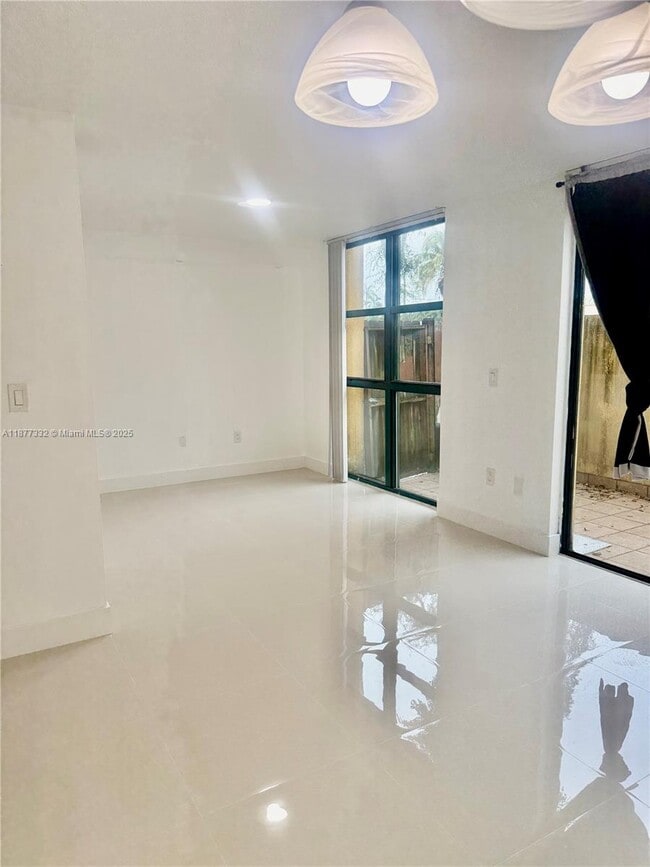 Building Photo - 11780 SW 18th St Unit 122-2 Rental