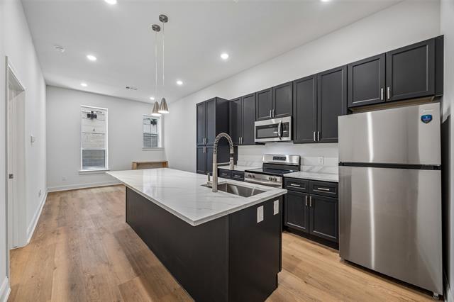 Building Photo - 2010 Commerce St Unit B203