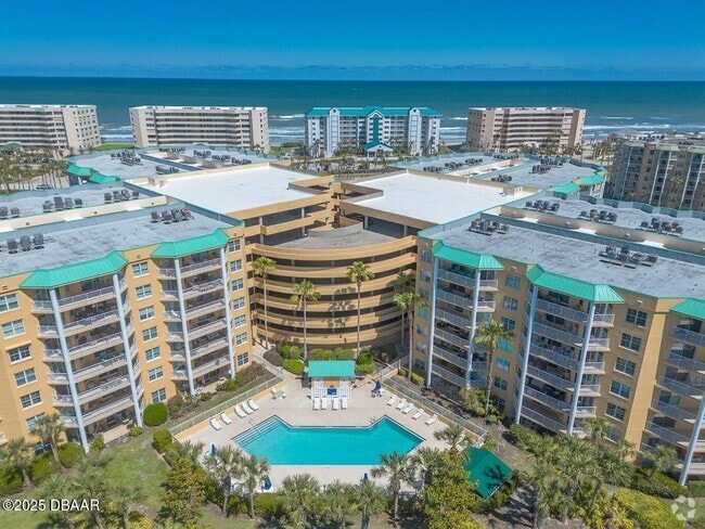 Building Photo - 4650 Links Village Dr Unit B205 Rental