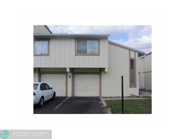 Building Photo - 2222 NW 59th Wy Unit 63-E Rental