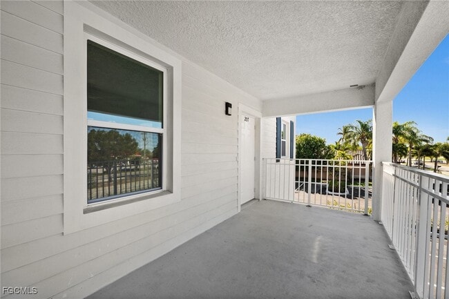 Building Photo - 3815 Chiquita Blvd S Unit 106