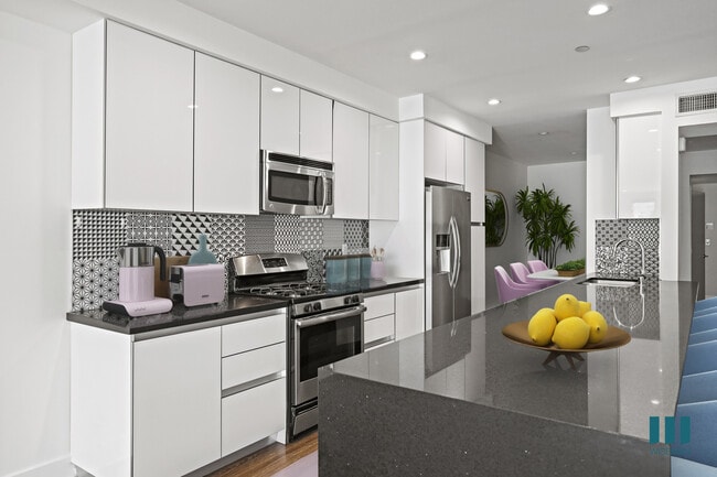 Kitchen with Stainless-Steel Appliances - Kelton Alexander by Wiseman