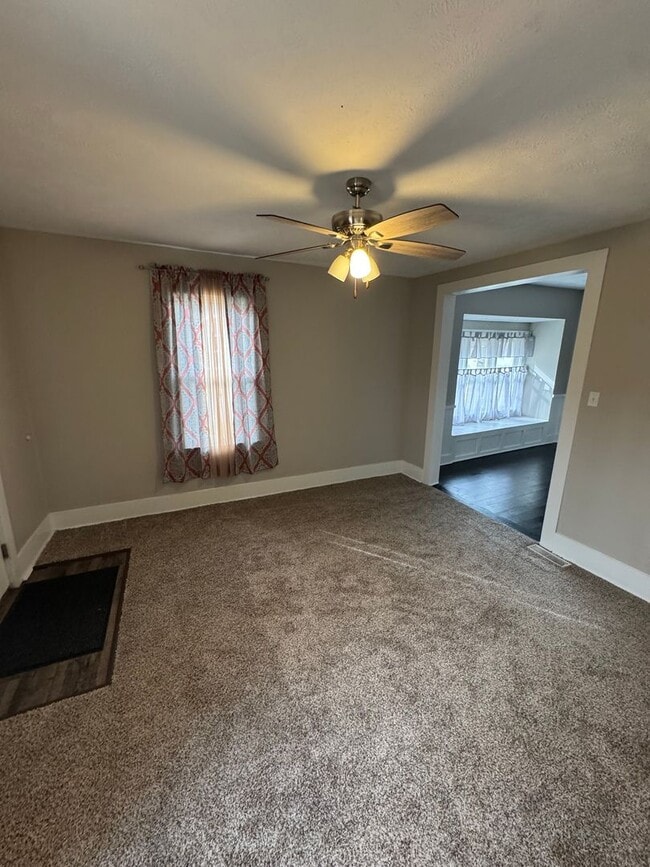 Photo - Charming 3-Bedroom Home with Den on Spacio...