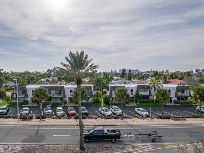 Building Photo - 8630 Blind Pass Rd Unit 12