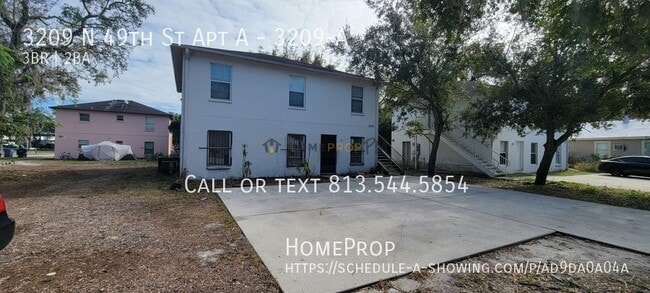 Building Photo - 3209 N 49th St Unit 3209-A