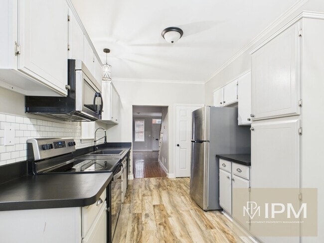 Photo - Beautiful 4 Bedroom, 1 Bath Home with Off-Street Parking!!