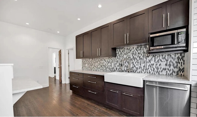 Tons of kitchen cabinets, gorgous backsplash - 1350 Dolores St