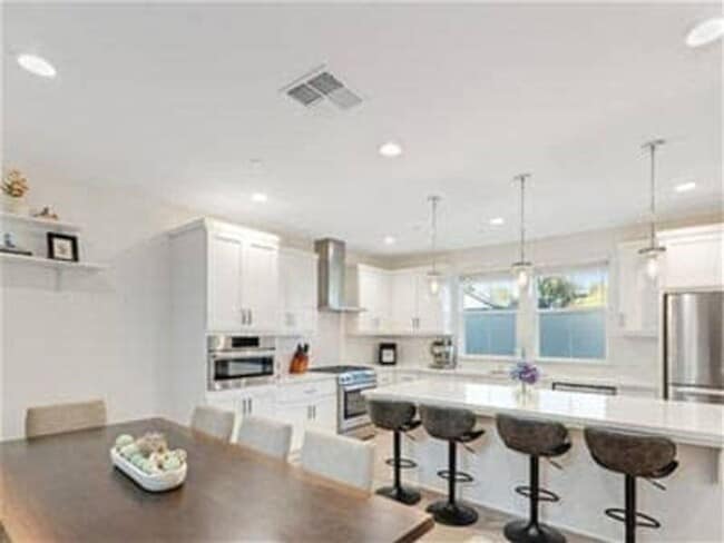 Photo - Beautiful, light filled home with EV charger, cozy backyard, very convenient SWSR location