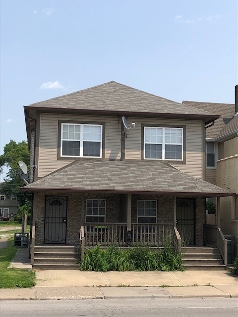 1421 is unit shown on the left hand side of building. - 1421 S Meridian St Townhome