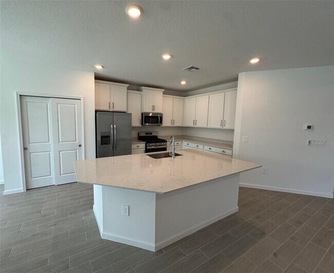 Photo - 13717 NW Convergence Blvd