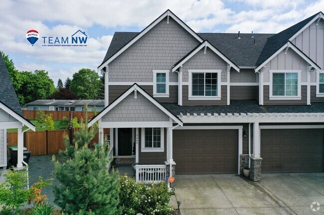 Building Photo - Spacious & Stylish 4-Bedroom A/C Townhome!