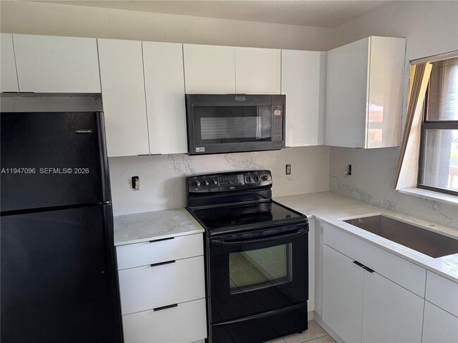 Building Photo - 6465 W 27th Ave Unit 43-203