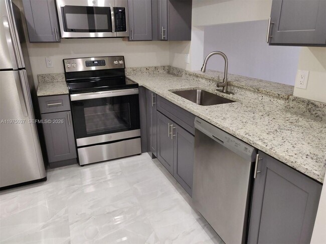 Photo - 8830 Royal Palm Blvd Unit 202