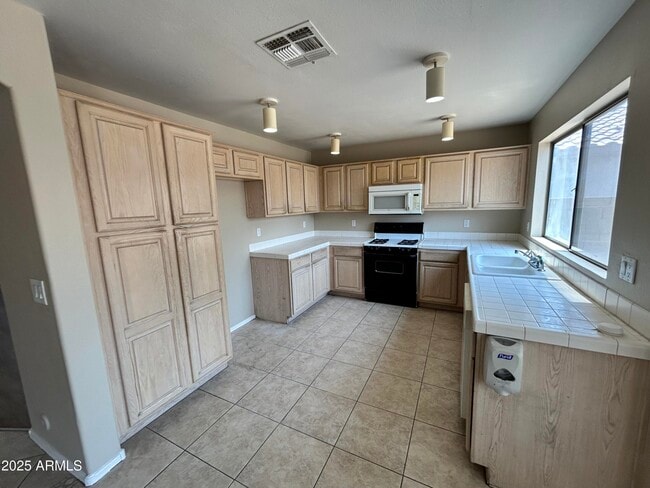 Photo - 8239 W Voltaire Ave