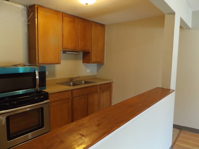 Photo - 710 W Huntington Commons Rd Unidad 1A