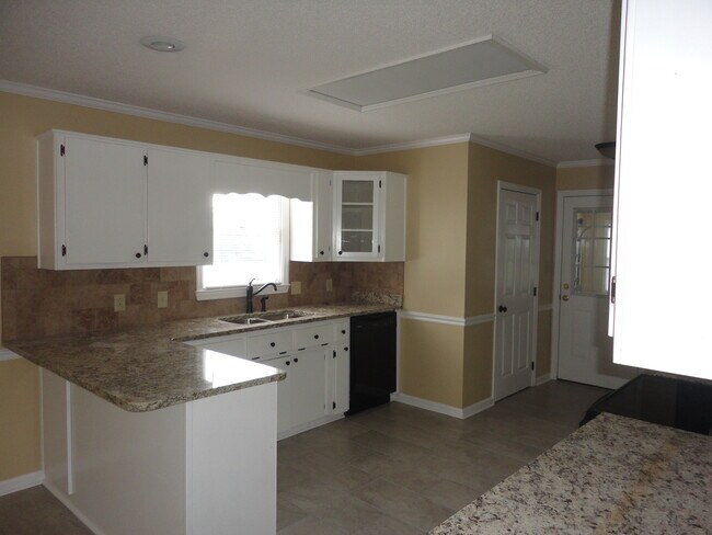 Photo - Discover Serenity: Elegant 3-Bedroom Home ...