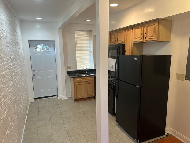 Photo - Charming 2-Bedroom, 1.5-Bathroom Brick Townhouse in Pigtown