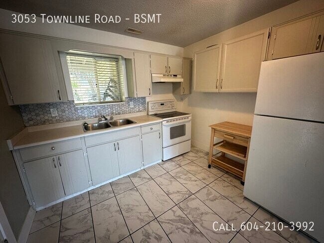 Photo - 2 Bedroom Basement Suite – Utilities Included Unit BSMT