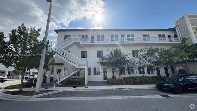 Building Photo - 6455 NW 103rd Pl Unit 101 Rental