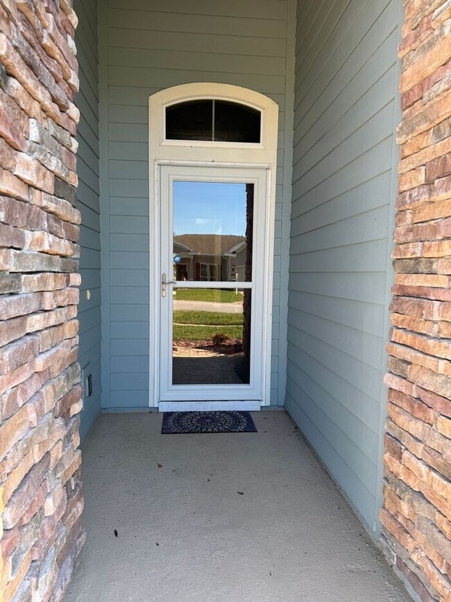 Photo - COMING SOON! Beautiful 4BR 3BA Home w/ Screened Lanai & Pond View • Garage Parking • Fenced Yard ...