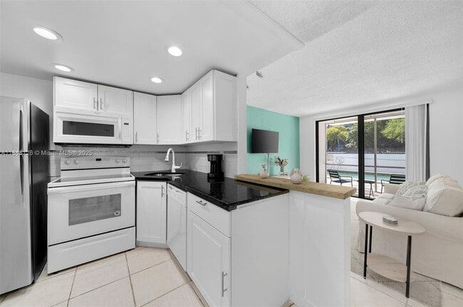 Photo - 2345 NE 135th St Apartment Unit 101