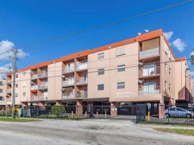 Building Photo - 6175 W 20th Ave Unit 309