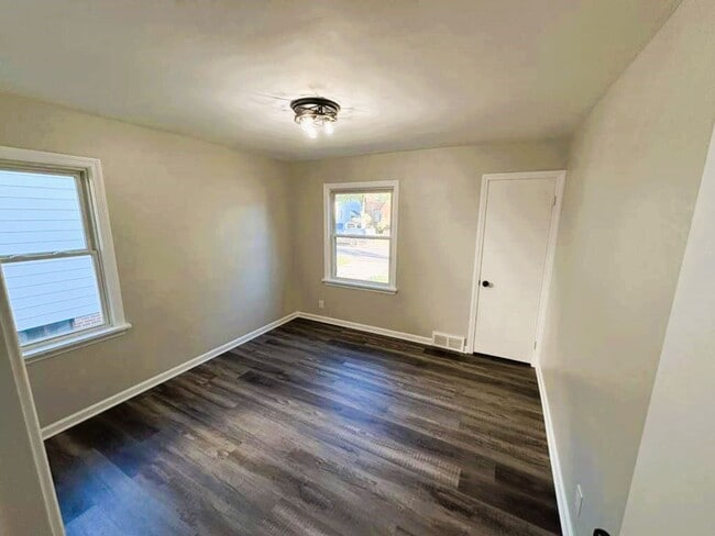 Photo - 4-Bedroom Home with Finished Basement & Mo...