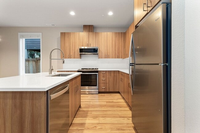 Photo - 2022 Build -Almost Brand New 3 br 2.5 bth Home with hardwoods, fenced yard and backs to greenspace !