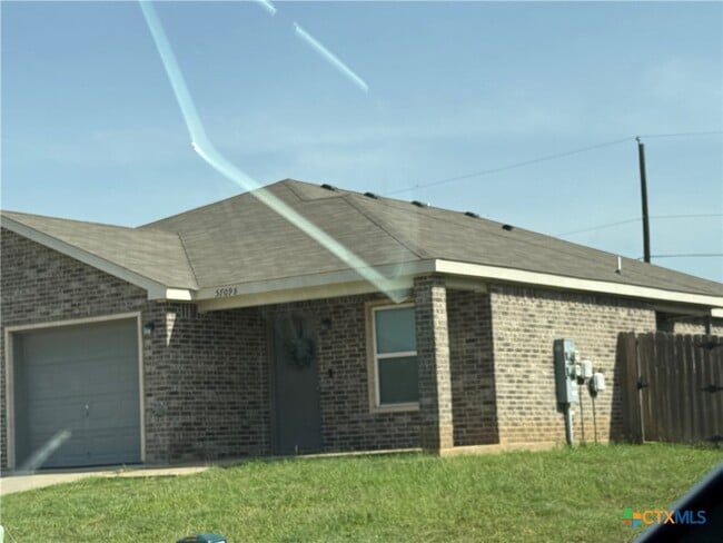 Building Photo - 5709 Rustler Dr Rental