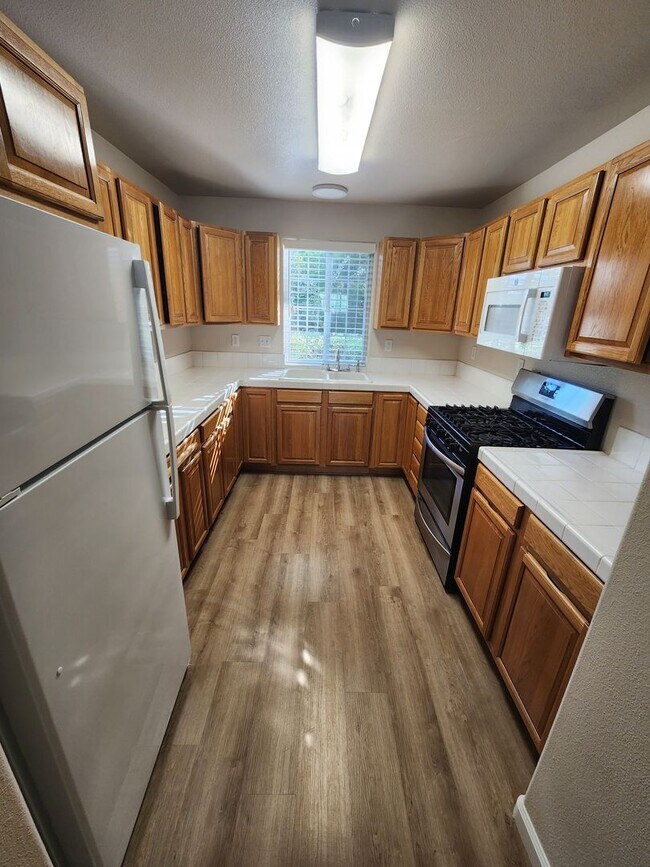 Photo - Downstairs 1 bedroom apartment with small patio and additional storage Unidad 3372 #1